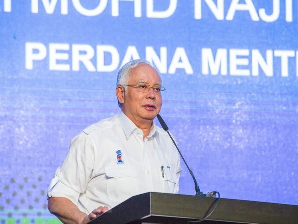 Prohiben al exprimer ministro malasio Najib Razak salir del pais hinh anh 1