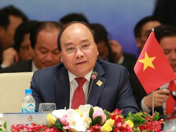 Concluye Premier de Vietnam visita a Canada hinh anh 1