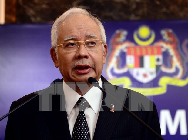 Exprimer ministro de Malasia Najik Razak enfrenta 10 cargos por corrupcion hinh anh 1