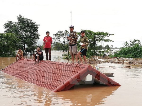 CMVietnam dispuesta a ayudar a superar secuelas por el colapso de presa hidroelectrica en Laos hinh anh 1