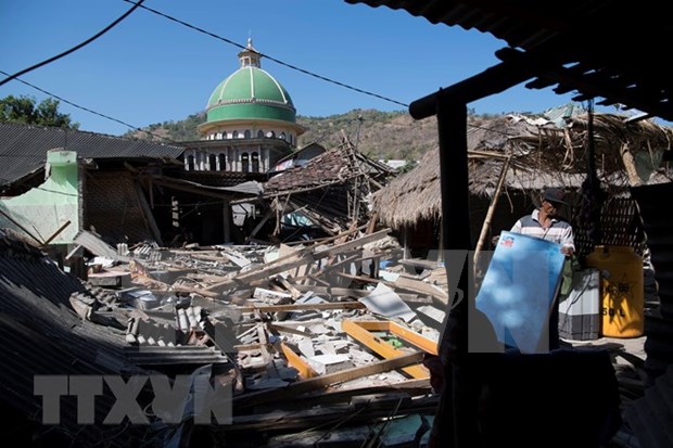 Saldo de fallecidos tras terremoto en Indonesia aumenta a 436 hinh anh 1