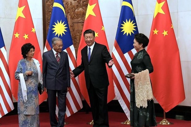 China y Malasia buscan fomentar cooperacion en medio de tensiones bilaterales hinh anh 1