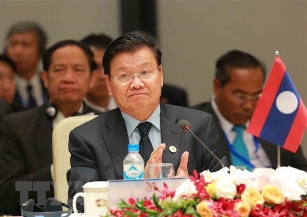 Primer ministro de Laos participara en FEM ASEAN 2018 en Vietnam hinh anh 1