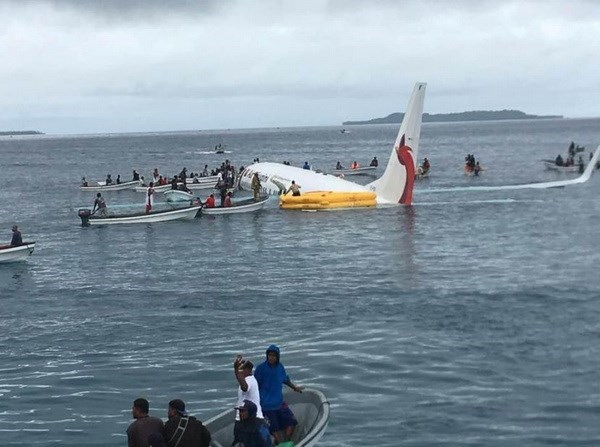 Registran cuatro vietnamitas a bordo del avion caido en una laguna de Micronesia hinh anh 1