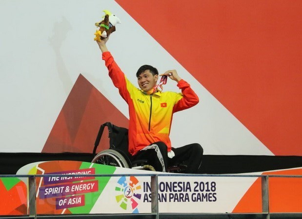 Nadador vietnamita bate record en Juegos Paralimpicos de Asia hinh anh 1