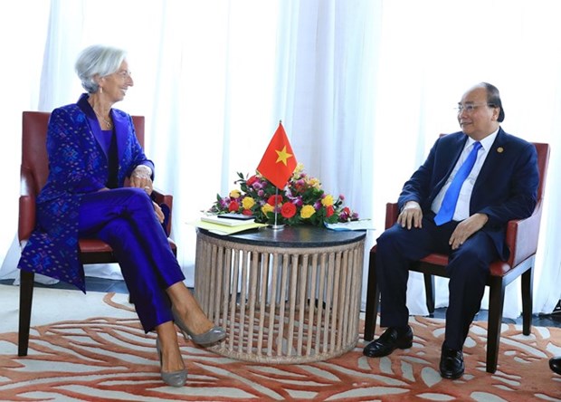 Jefe de gobierno de Vietnam se reune con directora del FMI en Bali hinh anh 1