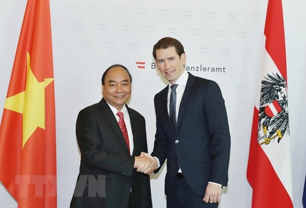 Primer ministro de Vietnam concluye visita a Austria y viaja a Belgica hinh anh 1