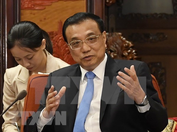 China busca elevar nivel de lazos multifaceticos con Singapur hinh anh 1