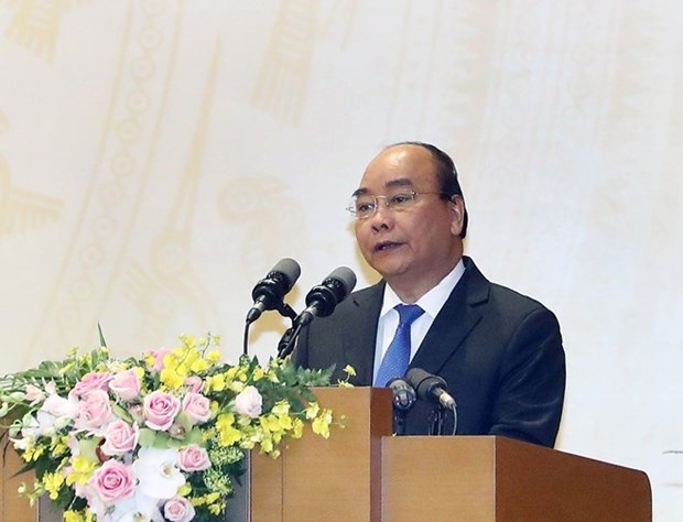 Gobierno de Vietnam continua priorizando en desarrollo socioeconomico y ambiental en 2019, afirma premier hinh anh 1