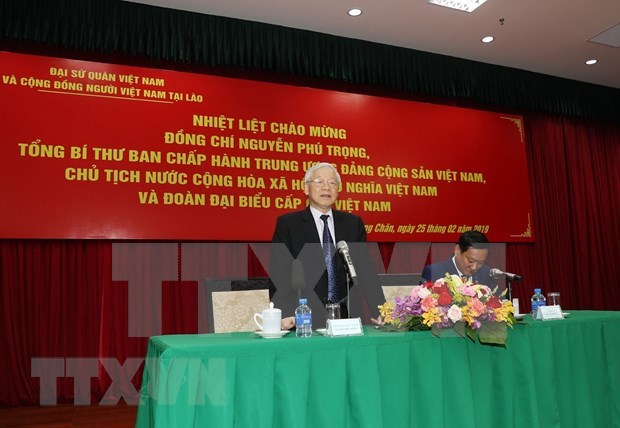 Exhorta presidente de Vietnam a que connacionales en Laos sean puente de conexion para fortalecer nexos bilaterales hinh anh 1