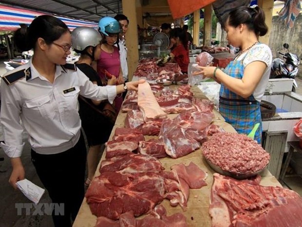 Firman Vietnam y Reino Unido acuerdo sobre comercializacion de la carne de cerdo hinh anh 1