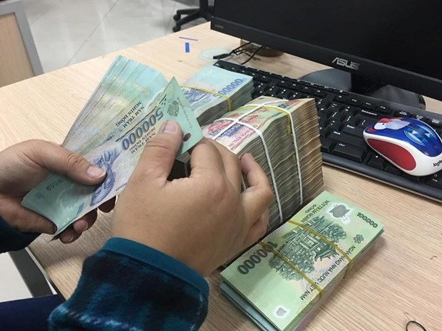 Exigen en Vietnam desarrollar el pago electronico para combatir la usura hinh anh 1