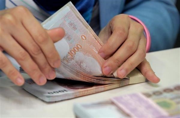 Bancos de Tailandia reducen tasas de interes de prestamos hinh anh 1