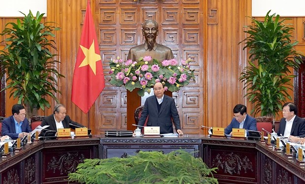 Premier de Vietnam preside reunion gubernamental sobre vinculos con Laos hinh anh 1