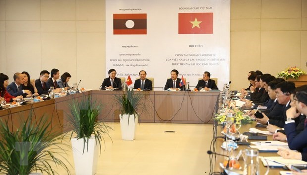 Aspira Laos a adquirir experiencias de diplomacia economica de Vietnam hinh anh 1