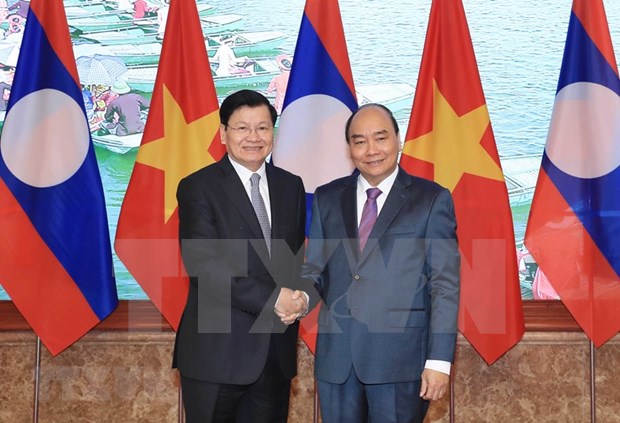 Vietnam y Laos trazan orientaciones para futuros lazos gubernamentales hinh anh 1