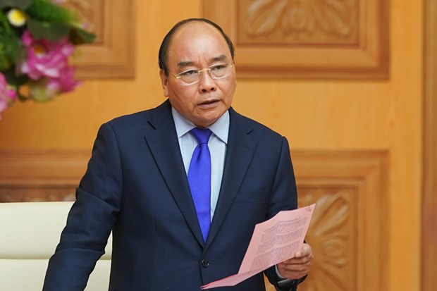 Premier vietnamita orienta medidas para mitigar impacto del nuevo coronavirus hinh anh 1