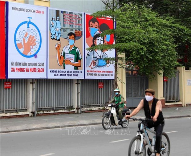 Inauguraran en junio exposicion fotografica sobre la lucha contra el COVID-19 en Vietnam hinh anh 1