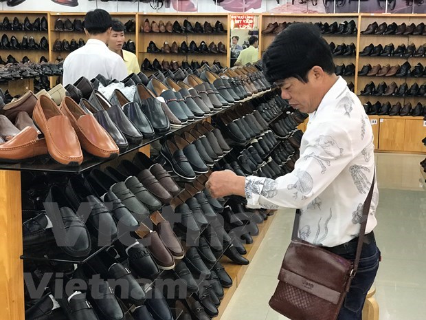 En paro miles de trabajadores indonesios de industria del calzado por el COVID-19 hinh anh 1