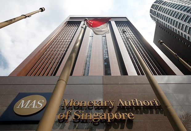 Bancos singapurenses registran record de depositos hinh anh 1