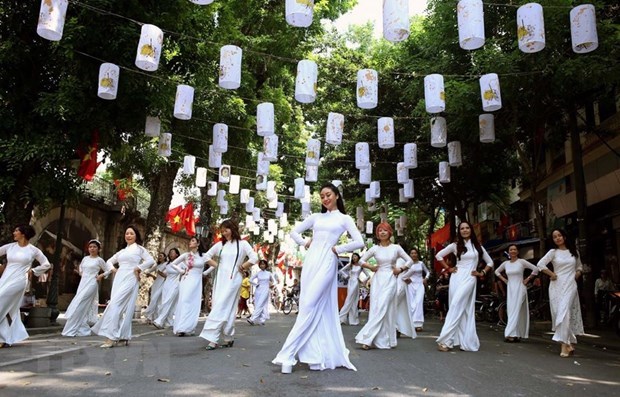Celebraran Festival Ao Dai en ciudad antigua de Hoi An hinh anh 1