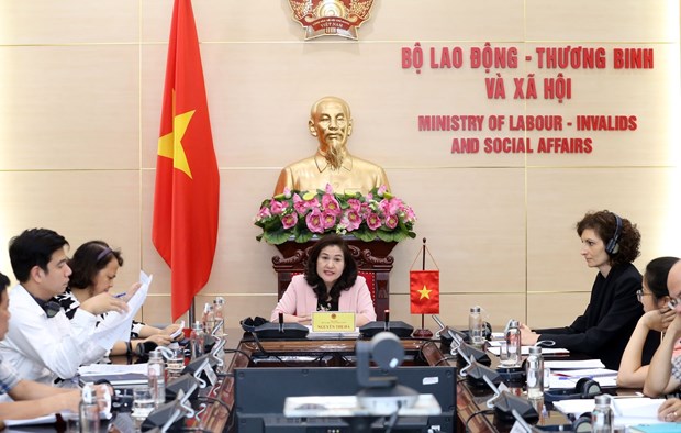 Vietnam y Suiza firman memorando de cooperacion en asuntos sociales y empleo hinh anh 1