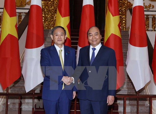 Premier vietnamita se reune con Suga Yoshihide hinh anh 1