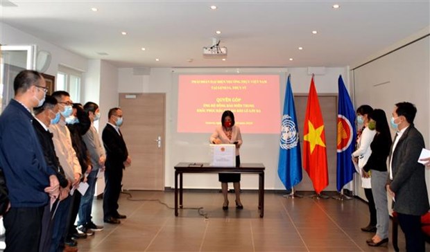 Comunidad vietnamita en Ginebra recauda fondos dedicados a coterraneos afectados por desastres hinh anh 1