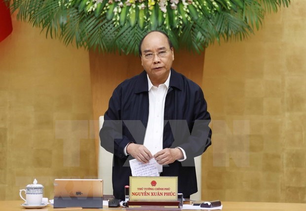 Premier de Vietnam exhorta a reforzar productividad para compensar perdidas por desastres naturales hinh anh 1