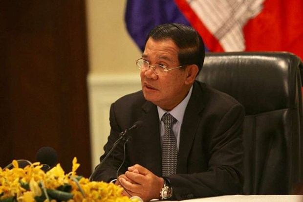 Primer ministro de Camboya y su conyuge dan negativo en prueba del COVID-19 hinh anh 1