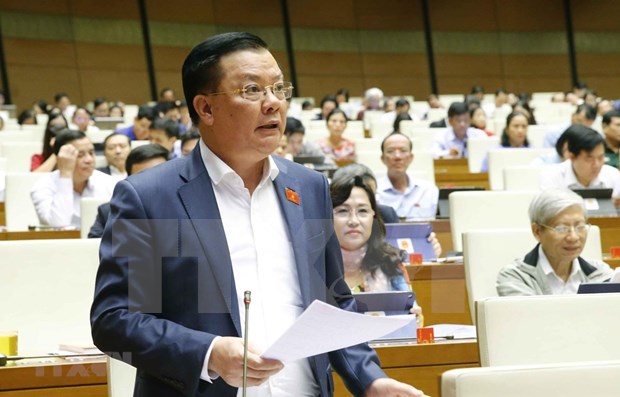 Ministro de Finanzas de Vietnam aclara dudas de diputados sobre asuntos presupuestarios hinh anh 1