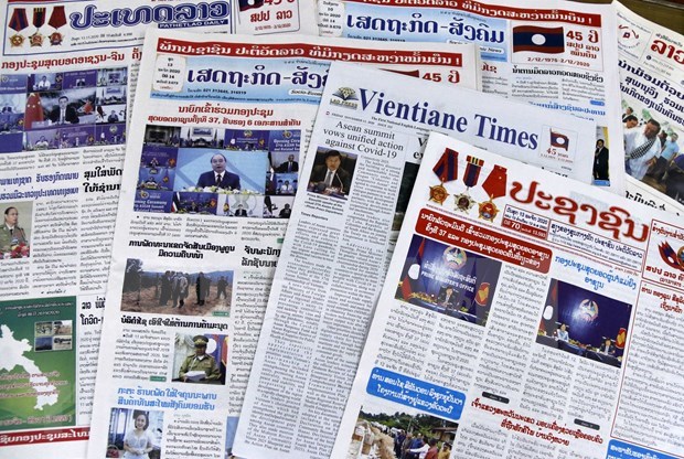 Prensa laosiana destaca 37a Cumbre de la ASEAN y eventos anexos hinh anh 1