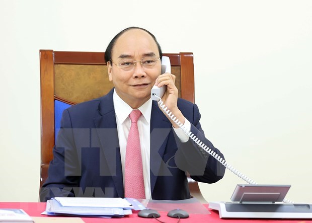 Premier vietnamita sostiene conversaciones telefonicas con su homologo holandes hinh anh 1