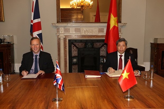 Firma de UKVFTA, punto de inflexion en relaciones Vietnam-Reino Unido hinh anh 1