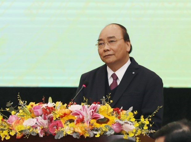 Sector financiero debe despertar fuerzas internas de Vietnam, segun el Primer Ministro hinh anh 1