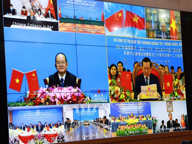 Localidades vietnamitas y chinas buscan promover amistad y cooperacion hinh anh 1