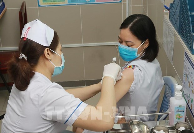 Comienza en Ciudad Ho Chi Minh segunda fase de vacunacion contra el COVID-19 hinh anh 1
