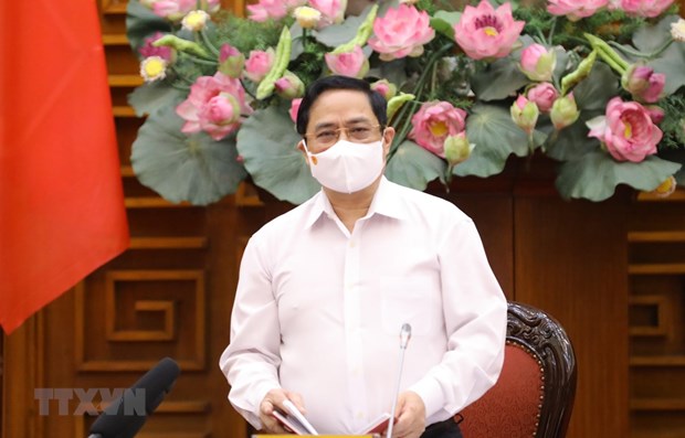 Llama premier de Vietnam a esfuerzos de toda la nacion contra COVID-19 hinh anh 1