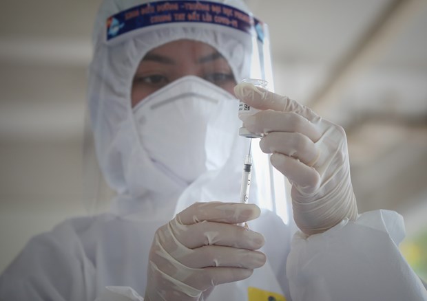 Vietnam aplica formula “5K+vacunas+tecnologias” en prevencion y control del COVID-19 hinh anh 1