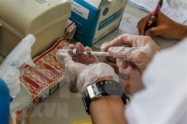 Gobierno de Laos prohibe uso comercial de vacunas hinh anh 1