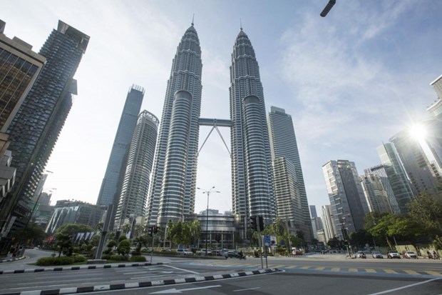 Malasia se esfuerza por recuperar la economia hinh anh 1