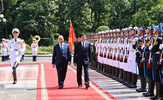Presidente de Vietnam da la bienvenida al maximo dirigente de Laos hinh anh 1