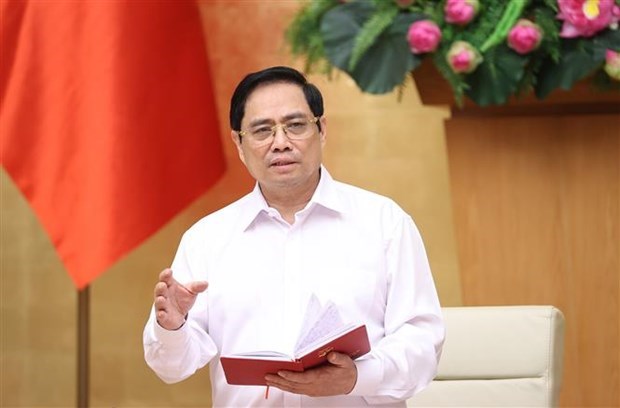 Urge premier vietnamita a controlar y repeler brotes del COVID-19 en localidades surenas hinh anh 2