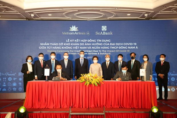 Vietnam Airlines y SeABank firman multimillonario contrato de refinanciamiento de prestamos hinh anh 1