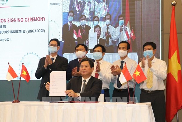 Empresas vietnamita y singapurense firman cooperacion estrategica hinh anh 1