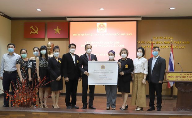 Vietnamitas en Tailandia apoyan Fondo nacional de vacunas contra el COVID-19 hinh anh 1