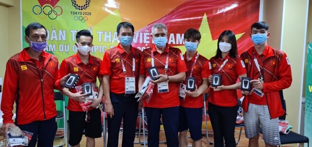Juegos Olimpicos Tokio 2020: Vietnamitas en Japon apoyan a sus deportistas hinh anh 2