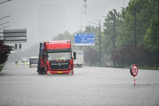 Vietnam expresa solidaridad con China ante graves perdidas por inundaciones hinh anh 1