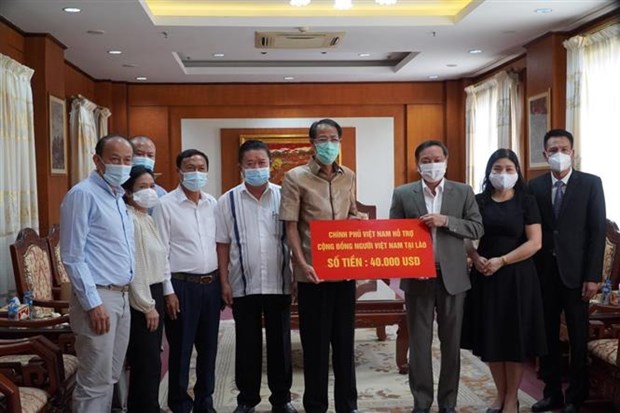 Vietnam respalda a compatriotas afectados por COVID-19 en Laos hinh anh 1