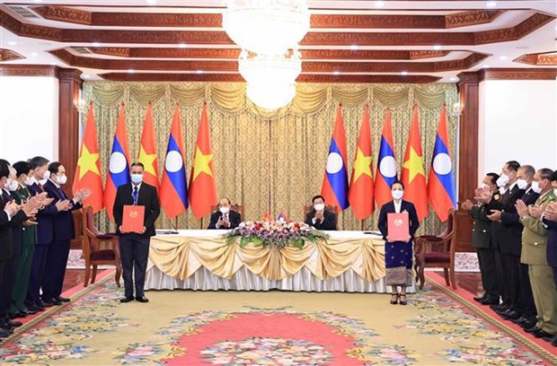 Presidente vietnamita se reune con maximo dirigente de Laos hinh anh 2